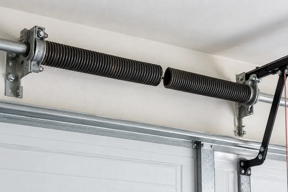 broken spring repair scene on an unbranded garage door in a Colorado home